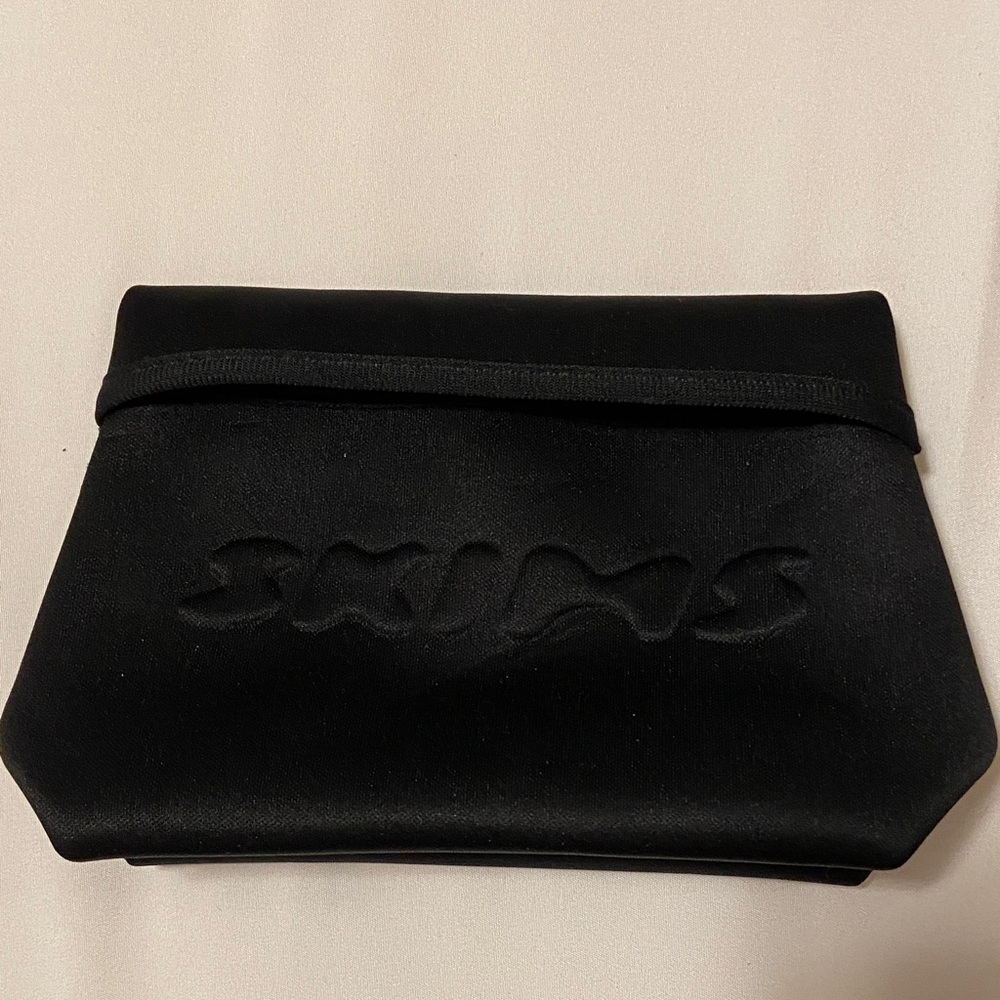SKIMS  Black Pouch